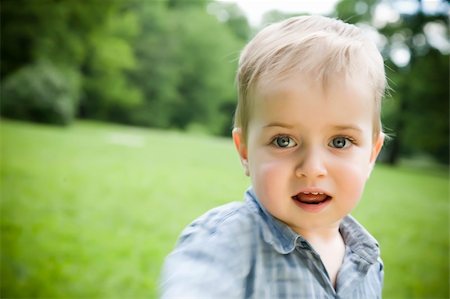 simsearch:400-04594888,k - Little Kid Portrait On The Nature Background Stock Photo - Budget Royalty-Free & Subscription, Code: 400-04069240