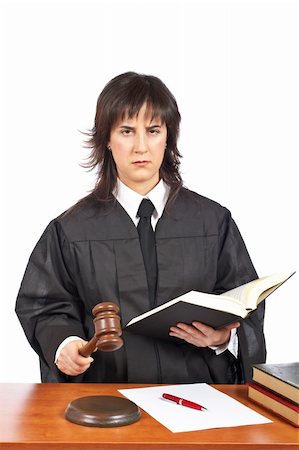 simsearch:700-00028739,k - A female judge in a courtroom striking the gavel. Shallow depth of field Stock Photo - Budget Royalty-Free & Subscription, Code: 400-04060667