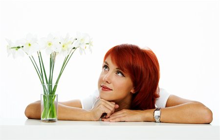 simsearch:400-04875091,k - young smiling woman is looking at the flower Stock Photo - Budget Royalty-Free & Subscription, Code: 400-04063545