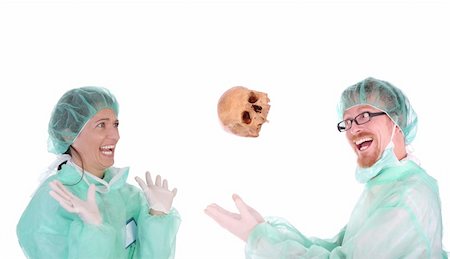 screaming skeleton skull - surgeon with skull and shouting shocked healthcare worker Stock Photo - Budget Royalty-Free & Subscription, Code: 400-04070878