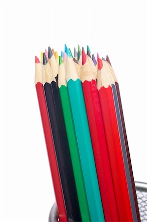 Assortment of coloured pencils in the basket on white background. Shallow depth of field Stock Photo - Budget Royalty-Free & Subscription, Code: 400-04071906