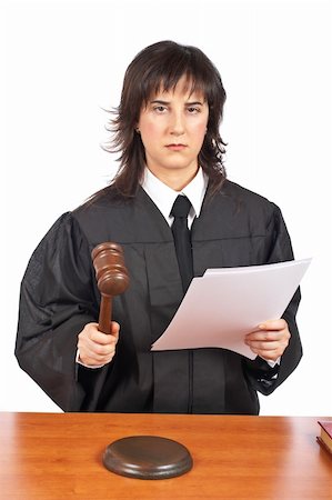 simsearch:700-00028739,k - A female judge in a courtroom reading the verdict and striking the gavel. Shallow depth of field Stock Photo - Budget Royalty-Free & Subscription, Code: 400-04072273