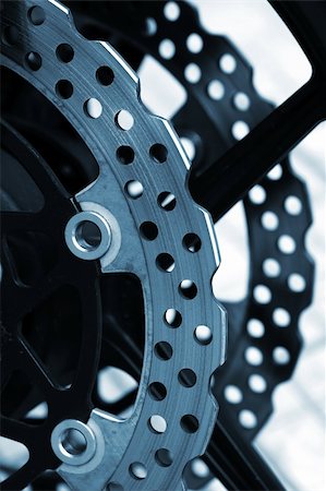 Closeup detail of a racing motorcycle's brake disc. Stock Photo - Budget Royalty-Free & Subscription, Code: 400-04072765