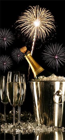 simsearch:400-05117424,k - Glasses of champagne with fireworks on black background Stock Photo - Budget Royalty-Free & Subscription, Code: 400-04073867