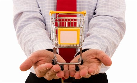simsearch:400-04321973,k - Shopping Concept - Hand holding a trolley shop (put your text on the Trolley) Stock Photo - Budget Royalty-Free & Subscription, Code: 400-04081752