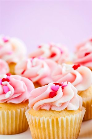 simsearch:400-04886615,k - Lots of tasty cupcakes with icing and sprinkles Stock Photo - Budget Royalty-Free & Subscription, Code: 400-04096308