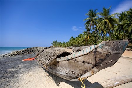 simsearch:400-03991814,k - Fisher man boat on the Varkala beach in India Stock Photo - Budget Royalty-Free & Subscription, Code: 400-04092824