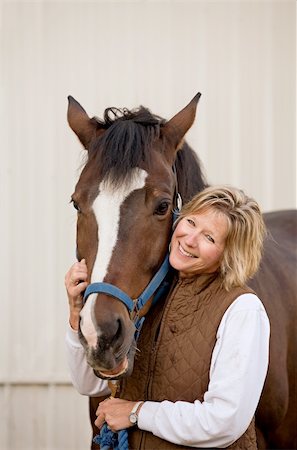 A Young Woman With Her Brown Horse Stock Photo - Budget Royalty-Free & Subscription, Code: 400-04105088