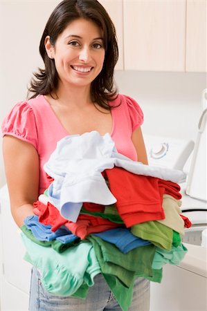 simsearch:400-07902993,k - Woman Doing Laundry Photographie de stock - Aubaine LD & Abonnement, Code: 400-04106141