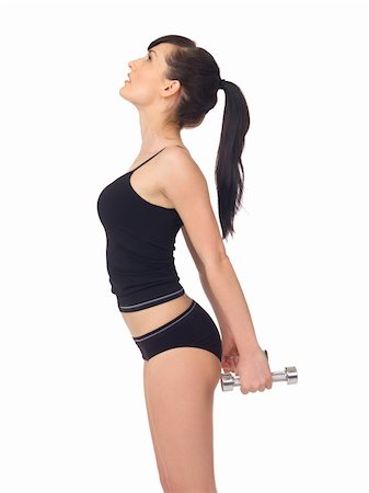 simsearch:400-06915547,k - Young beautiful woman during fitness time and exercising Foto de stock - Super Valor sin royalties y Suscripción, Código: 400-04106877
