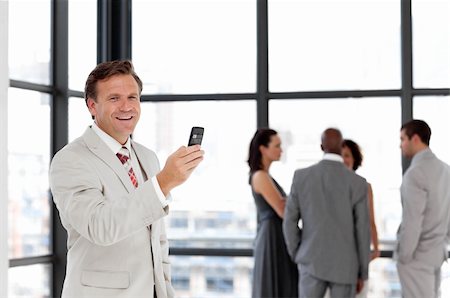 simsearch:400-05145011,k - Potrait of a Senior business man on phone Stock Photo - Budget Royalty-Free & Subscription, Code: 400-04106922