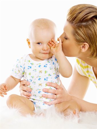 simsearch:400-04397639,k - Young attractive mother kissing cute little baby Photographie de stock - Aubaine LD & Abonnement, Code: 400-04109851