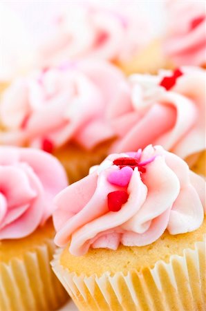 simsearch:400-04886615,k - Lots of tasty cupcakes with icing and sprinkles Stock Photo - Budget Royalty-Free & Subscription, Code: 400-04103488
