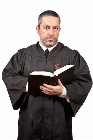 simsearch:700-00028739,k - Serious male judge holding the gavel and reading a book, isolated on white background over a white background Stock Photo - Budget Royalty-Free & Subscription, Code: 400-04114017