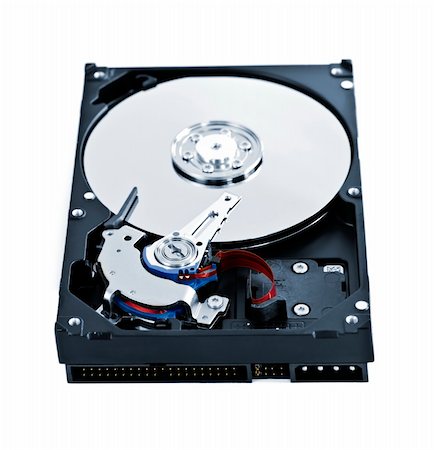 disk drive - Isolated hard disk drive case showing internal components Stock Photo - Budget Royalty-Free & Subscription, Code: 400-04114227