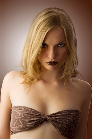 simsearch:400-06428713,k - fashion portrait of pretty sensual blond looking in camera angry Stock Photo - Budget Royalty-Free & Subscription, Code: 400-04117841
