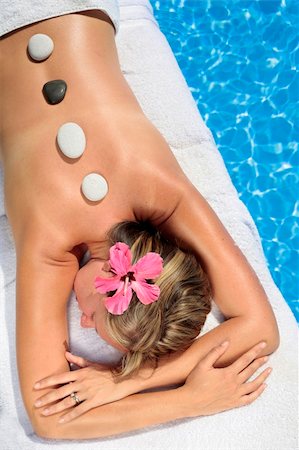 simsearch:400-05318677,k - Woman at a spa with white stone on her forehead Stock Photo - Budget Royalty-Free & Subscription, Code: 400-04117981