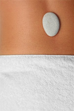 spanishalex (artist) - Composition of white pebble, white towel and skin Stock Photo - Budget Royalty-Free & Subscription, Code: 400-04118075