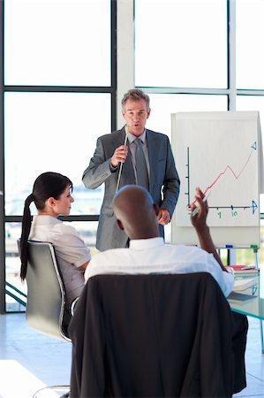 simsearch:400-04113367,k - Business people in a meeting in the office Stock Photo - Budget Royalty-Free & Subscription, Code: 400-04119607