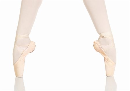 simsearch:400-04119672,k - Young caucasian ballerina girl on white background and reflective white floor showing various ballet steps and positions. Not Isolated Stock Photo - Budget Royalty-Free & Subscription, Code: 400-04119684