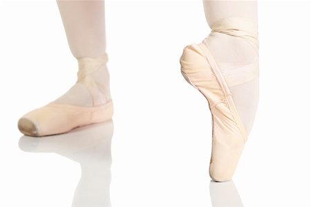 simsearch:400-04119672,k - Young caucasian ballerina girl on white background and reflective white floor showing various ballet steps and positions. Not Isolated Stock Photo - Budget Royalty-Free & Subscription, Code: 400-04119685