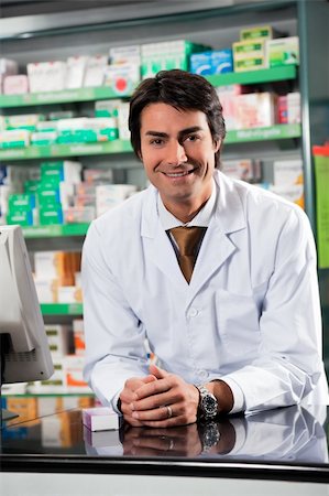 portrait of mid adult pharmacist looking at camera Stock Photo - Budget Royalty-Free & Subscription, Code: 400-04110169