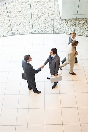 simsearch:400-04609965,k - business handshakes Stock Photo - Budget Royalty-Free & Subscription, Code: 400-04111397