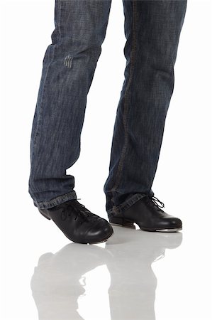 simsearch:400-05701566,k - Seul danseur de claquettes mâle portant des jeans montrant diverses étapes en studio avec fond blanc et plancher réfléchissant. Non isolé Photographie de stock - Aubaine LD & Abonnement, Code: 400-04124457