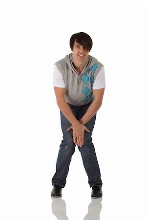 simsearch:400-05701566,k - Unique caucasienne mâle danseur de claquettes portant des jeans montrant diverses étapes en studio avec fond blanc et plancher réfléchissant. Non isolé Photographie de stock - Aubaine LD & Abonnement, Code: 400-04124458