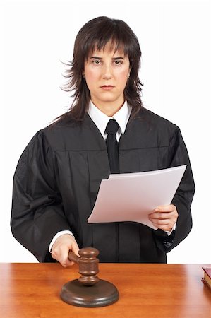 simsearch:700-00028739,k - A female judge in a courtroom reading the verdict and striking the gavel. Shallow depth of field Stock Photo - Budget Royalty-Free & Subscription, Code: 400-04126031