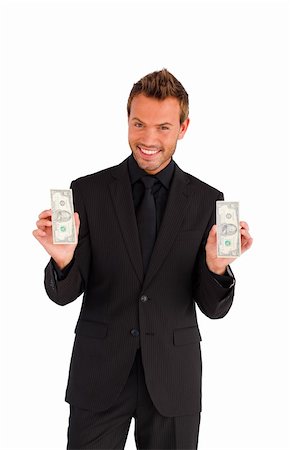 simsearch:400-05718324,k - Happy businessman with money looking at the camera Stock Photo - Budget Royalty-Free & Subscription, Code: 400-04126241
