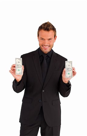 simsearch:400-05715207,k - Successful young businessman holding money in his hands Stock Photo - Budget Royalty-Free & Subscription, Code: 400-04126242