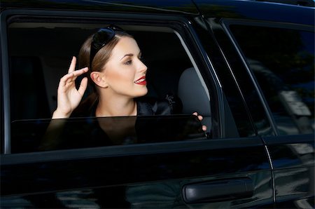 Portrait of beautiful business woman inside the limo car Stock Photo - Budget Royalty-Free & Subscription, Code: 400-04126856