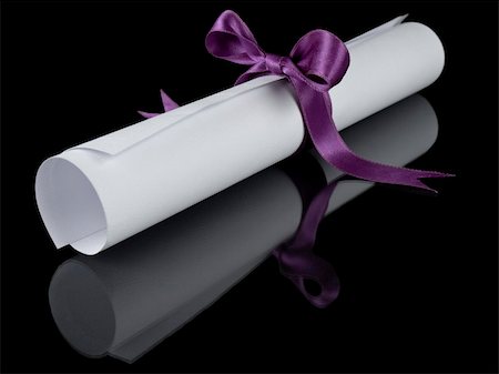 simsearch:400-04408371,k - Diploma with a violet silk ribbon, isolated on black background. Stock Photo - Budget Royalty-Free & Subscription, Code: 400-04127322