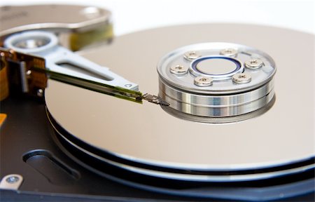 simsearch:400-05238336,k - Internals of a harddisk HDD Stock Photo - Budget Royalty-Free & Subscription, Code: 400-04127755
