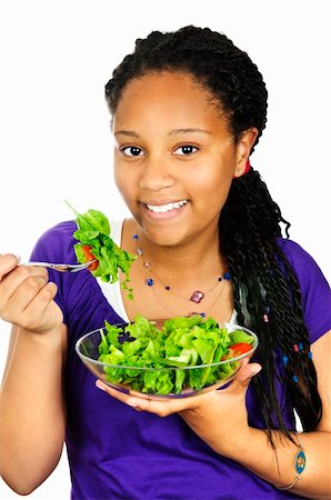 Isolated portrait of black teenage girl with salad bowl Stock Photo - Budget Royalty-Free & Subscription, Code: 400-04128246