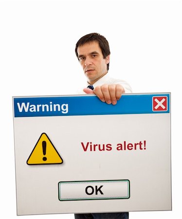 simsearch:400-03933798,k - Serious businessman holding computer message box with virus alert - isolated, wide-angle, focus on face Stock Photo - Budget Royalty-Free & Subscription, Code: 400-04129518