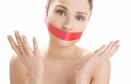 simsearch:400-04175955,k - Beautiful woman with red tape on mouth portrait isolated on white Stock Photo - Budget Royalty-Free & Subscription, Code: 400-04129620