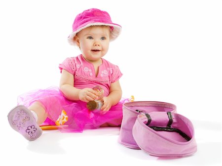 A charmimg baby girl in pink clothing Stock Photo - Budget Royalty-Free & Subscription, Code: 400-04136788