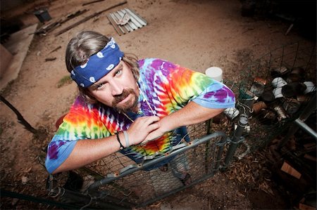 Colorful hippie leaning on a gate Stock Photo - Budget Royalty-Free & Subscription, Code: 400-04138163