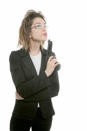 simsearch:400-04131198,k - Businesswoman with messy hair and handgun over white studio background Stock Photo - Budget Royalty-Free & Subscription, Code: 400-04130138