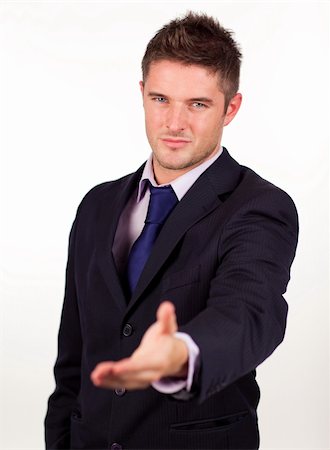 simsearch:400-04609965,k - Attractive businessman showing a handshake to the camera Stock Photo - Budget Royalty-Free & Subscription, Code: 400-04131267
