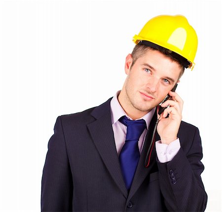 Young Construction worker talking on the phone Stock Photo - Budget Royalty-Free & Subscription, Code: 400-04131271