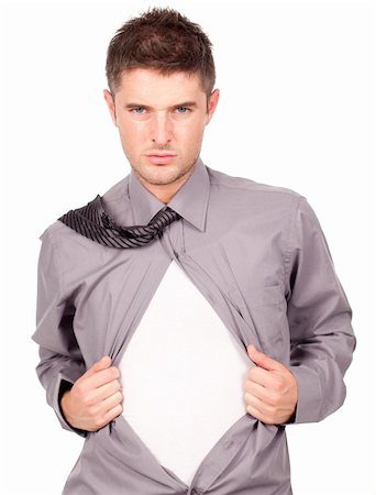 Young attractive man pulling a his t-shirt open Stock Photo - Budget Royalty-Free & Subscription, Code: 400-04131295