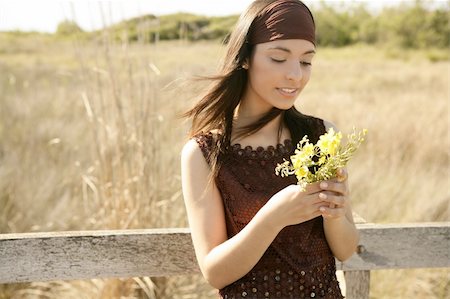 simsearch:400-04399510,k - Beautiful woman in golden outdoor with yellow flower Stock Photo - Budget Royalty-Free & Subscription, Code: 400-04132198