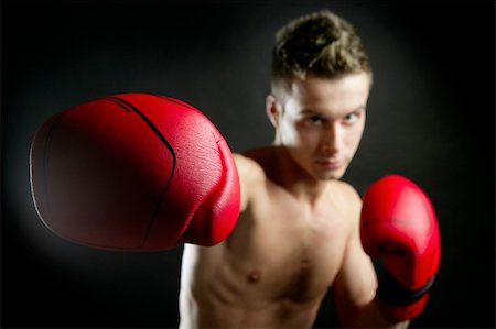 simsearch:400-04970057,k - Boxer, young age handsome man over black background Stock Photo - Budget Royalty-Free & Subscription, Code: 400-04132492