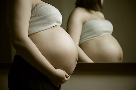 simsearch:400-04396054,k - photo of pregnant woman in front of mirror Stock Photo - Budget Royalty-Free & Subscription, Code: 400-04133865