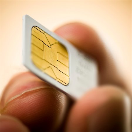 sim - A macro image of a mobile phone sim card. Stock Photo - Budget Royalty-Free & Subscription, Code: 400-04147663