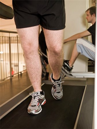 simsearch:400-04148009,k - Man running on a treadmill in a healthclub Photographie de stock - Aubaine LD & Abonnement, Code: 400-04149214