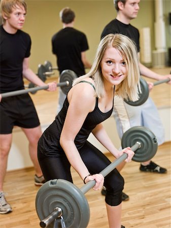 simsearch:400-04148009,k - Girl lifting weights at the gym Photographie de stock - Aubaine LD & Abonnement, Code: 400-04149239
